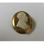 A large oval cameo of a gent in 15 carat gold fram
