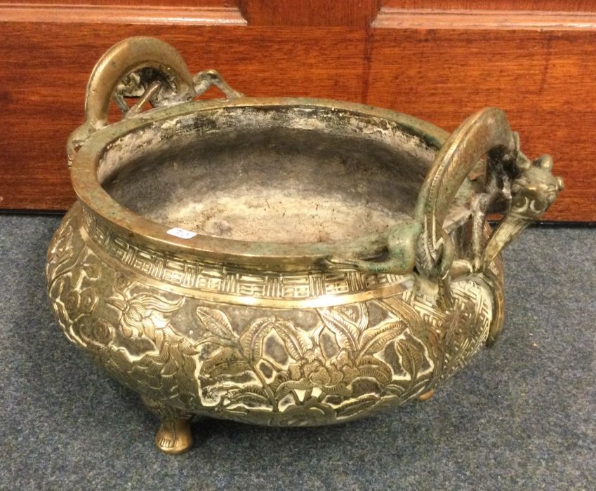 A large heavy brass censer of typical form profuse
