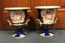 A pair of 19th Century blue and white campana shap