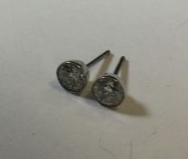 A good pair of diamond single stone ear studs in w