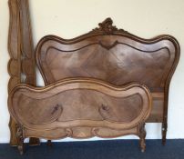 A French Kingswood bed. Est. £80 - £120.