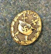 A World War II Nazi ward badge. Est. £10 - £20.