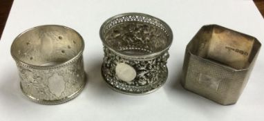A group of three heavy silver napkin rings. Approx