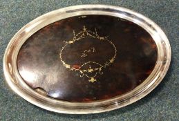 A large silver and tortoiseshell tray. London 1927. By Mappin and Webb. Approx. 280 grams. Est. £140