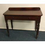 A Victorian single drawer writing desk. Est. £20 -