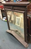 A large carved oak over mantle mirror. Est. £20 -