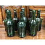 A group of old glass bottles. Est. £10 - £20.