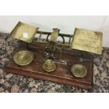 A large set of brass postal scales. Est. £30 - £40