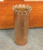 TRENCH ART: A heavy copper shell case decorated wi