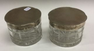 A good pair of engine turned silver and glass boxes. London 1914. By Mappin and Webb. Est. £60 - £