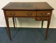 An Edwardian mahogany hinge top desk. Est. £50 - £