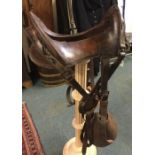 An American 12 inch leather Cavalry saddle dated 1