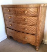 A satinwood bow chest of five drawers. Est. £40 -