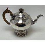 A good Georgian silver teapot of baluster form. Lo