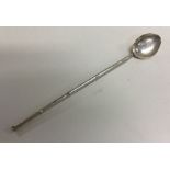 A large Chinese silver cocktail spoon with bamboo decoration. Approx. 10 grams. Est. £20 - £30.