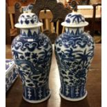 A tall pair of Chinese blue and white vases and co