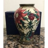 MOORCROFT: A boxed trial spike vase. Approx. 17cms