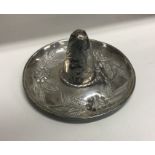 A heavy finely engraved silver model of a sombrero. Approx. 82 grams. Est. £60 - £80.