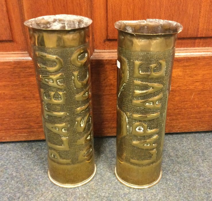 TRENCH ART: A good pair of embossed shell cases. E