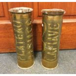 TRENCH ART: A good pair of embossed shell cases. E