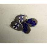 A pair of silver and enamel cufflinks. Approx. 8 grams. Est. £30 - £50.