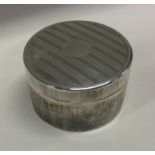 WANG HING: A heavy circular Chinese silver box. Marked to base. Circa 1890. Approx. 145 grams.