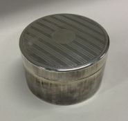 WANG HING: A heavy circular Chinese silver box. Marked to base. Circa 1890. Approx. 145 grams.