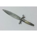 A delightful silver and MOP bookmark. Birmingham circa 1890s. Approx. 7 grams. Est. £50 - £80.