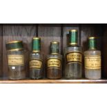 A group of old poison bottles. Est. £20 - 30.