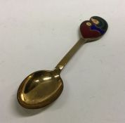 GEORG JENSEN: A heavy silver and enamel spoon. Approx. 46 grams. Est. £40 - £60.