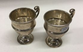 EDINBURGH: A pair of Scottish silver egg cups. 1979. By Hamilton and Inches. Approx. 65 grams.