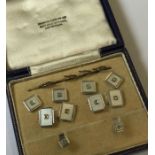 A good set of gold, enamel and diamond cufflinks a