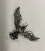 A silver model of an eagle. Approx. 15 grams. Est. £20 - £30.