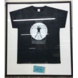 A framed and glazed Billy Connolly T-shirt together with a signe