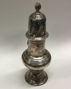 A Victorian silver caster. London 1899. By Charles Stuart Harris. Approx. 167 grams. Est. £120 - £