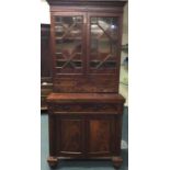 A Victorian mahogany two door bookcase. Est. £100