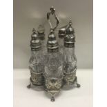 EDINBURGH: A heavy George III Scottish silver mounted glass cruet. 1767. By William Davie. Est. £400