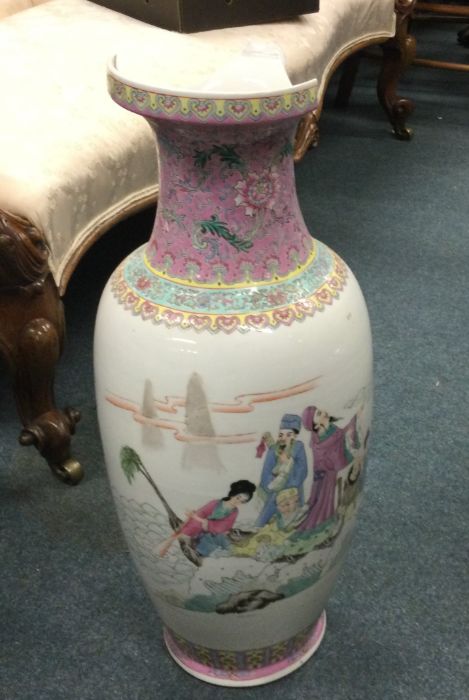 A tall Chinese vase decorated with figures in brig - Image 2 of 2
