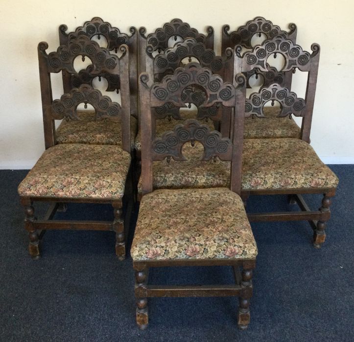 A set of seven hall chairs. Est. £50 - £80.