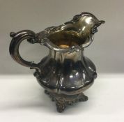 A heavy Victorian silver cream jug with chased top. London 1841. By John James Keith. Approx. 257