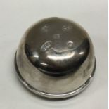 A heavy Millenium silver coaster. By Richard Comyns. Approx. 134 grams. Est. £50 - £80.