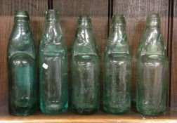 Five old bottles. Est. £10 - £20.