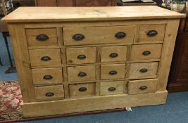 A good large pine fifteen drawer chest. Est. £200