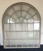 A large glass panelled window. Est. £60 - £80.