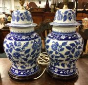 A tall pair of Chinese blue and white cases conver