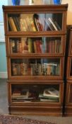 A four section oak Globe Wernicke bookcase. Est. £