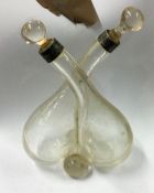 A silver mounted conjoining glass oil and vinegar