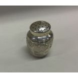 A Chinese silver pepper. Marked to base. Circa 1900. Approx. 26 grams. Est. £30 - £50.