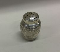 A Chinese silver pepper. Marked to base. Circa 1900. Approx. 26 grams. Est. £30 - £50.