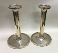 A pair of Art Nouveau pair silver candlesticks. Birmingham 1926. By Walker and Hall Approx. 946